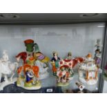 A QTY OF ANTIQUE AND OTHER STAFFORDSHIRE FLATBACK FIGURES, A NYMPHENBURG HORSE AND RIDER