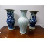 TWO SIMILAR CHINESE CELADON GROUND VASES PAINTED IN BLUE WITH FLOWERS AND FOLIAGE. H 37cms. TOGETHER