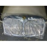 A VINTAGE MG MGA CHROME RADIATOR GRILL.