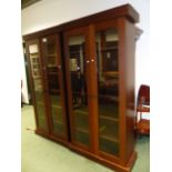 A PAIR OF CONTEMPORARY TALL GLAZED DISPLAY BOOKCASES EACH 110 CM WIDE X 220 CM HIGH