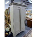 A PAINTED TWO DOOR HALL CABINET.
