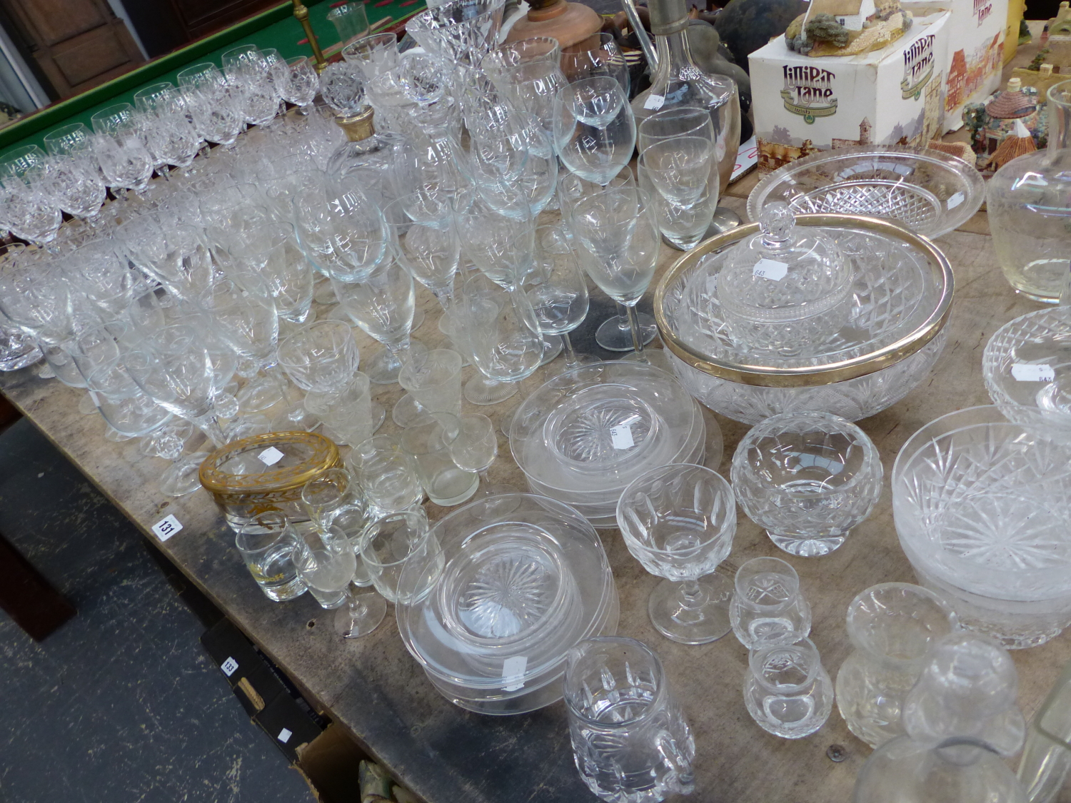 AN EXTENSIVE COLLECTION OF DRINKING GLASSES, DECANTERS, BOWLS CUT GLASS ETC.