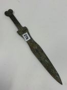 A BRONZE RITUALISTIC STYLE DAGGER.