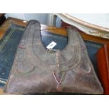 A MAASAI BEADED LEATHER BAG OR GRIS-GRIS. 50 x 44cms.