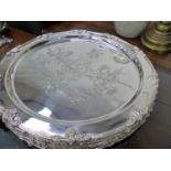 SIX LARGE ARMORIAL DECORATED SILVER PLATED PLATTERS.