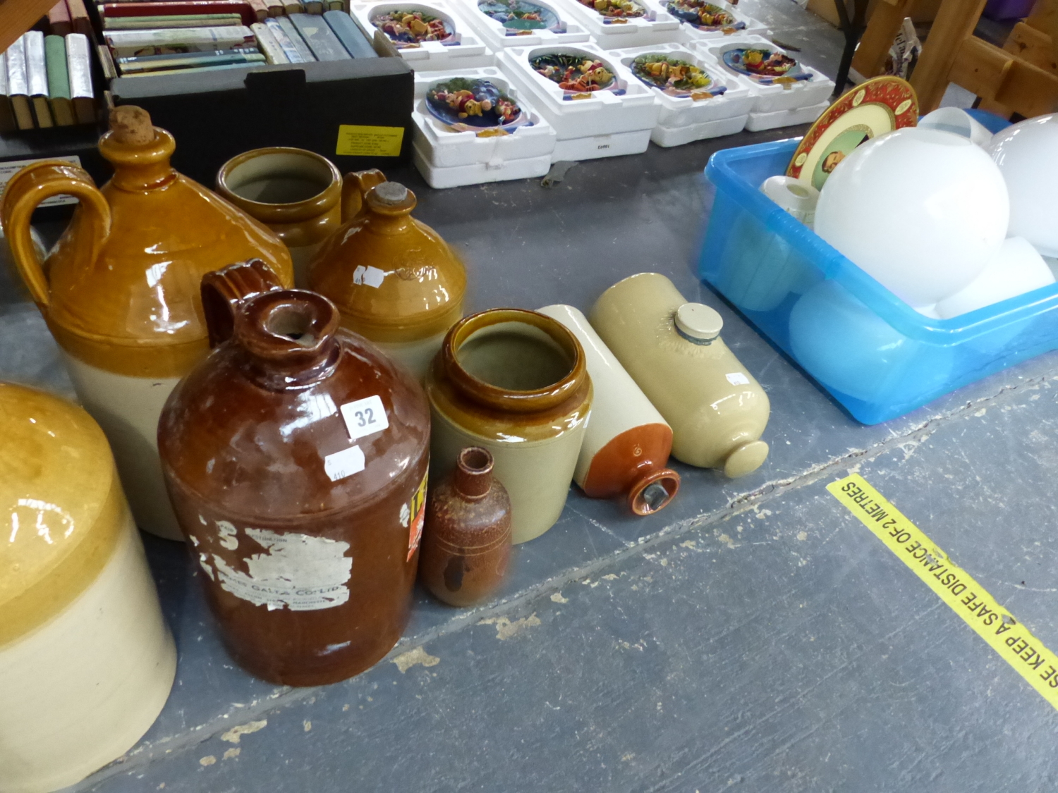 A GROUP OF STONEWARE FLAGON'S AND TWO HOT WATER BOTTLES