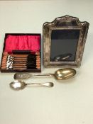 A HALLMARKED SILVER FRONTED PHOTO FRAME, TOGETHER WITH, A VICTORIAN SILVER SERVING SPOON, A SET OF