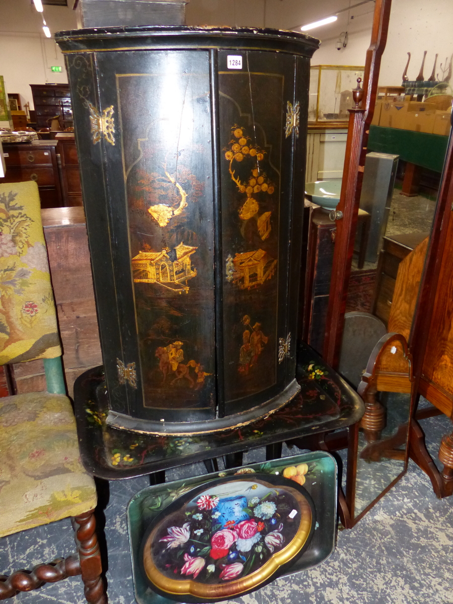 A GEORGIAN LACQUERED CORNER CABINET, AND THREE TRAYS.