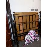 AN ANTIQUE BRASS AND IRON DOUBLE BED.