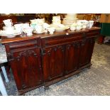 A WILLIAM IV BREAK FRONT MAHOGANY SIDE CABINET.