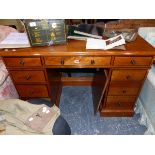 A MODERN VICTORIAN STYLE PEDESTAL DESK.