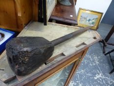 A EARLY LARGE WOODEN PESTLE.