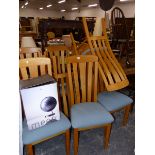 A SET OF TEN MODERN SLAT BACK DINING CHAIRS WITH PADDED SEATS.