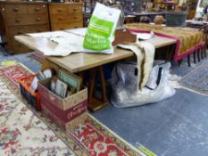 A BESPOKE HARDWOOD LARGE DINING TABLE ON SHAPED TRESTLE SUPPORT.