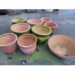 NINE VARIOUS TERRACOTTA PLANT POTS