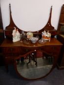 A GOOD QUALITY EDWARDIAN MAHOGANY DRESSING TABLE, WITH LARGE SHIELD FORM MIRROR.