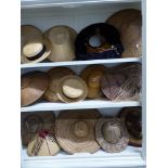 A QUANTITY OF EASTERN AND OTHER WOVEM STRAW AND REED HATS.
