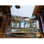 A ARTISTS PAINT BOX AND BRUSHES.