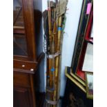 A QUANTITY OF VINTAGE FISHING RODS ETC.