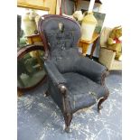 A VICTORIAN BALLOON BACK ARMCHAIR.