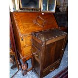 A SMALL OAK BUREAU, AND AN OAK SIDE CABINET.