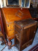 A SMALL OAK BUREAU, AND AN OAK SIDE CABINET.