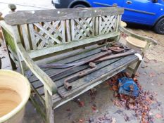 A LATTICE BACK GARDEN BENCH