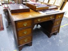 A GOOD QUALITY MAHOGANY AND WALNUT KNEEHOLE WRITING DESK.