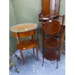 A CONTINENTAL STYLE BRASS MOUNTED TWO TIER OCCASIONAL TABLE AND A FOLDING CAKE STAND.