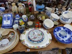 A VICTORIAN OIL LAMP, A LARGE VICTORIAN GLASS DOOR STOP, GLASS VASES AND DECANTERS, DINNER WARES