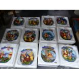 THE BRADFORD EXCHANGE, TWELVE WINNIE THE POOH WALL HANGING LIMITED EDITION PLATES.
