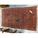 AN ANTIQUE BELOUCH RUG, 198 X 109cms.