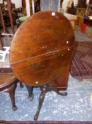 A 19th C. MAHOGANY TRIPOD TABLE.