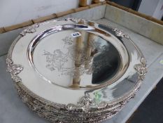 ELEVEN SMALL ARMORIAL DECORATED SILVER PLATED PLATTERS.