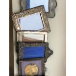 A GROUP OF SIX SILVER FRONTED PHOTOGRAPH FRAMES AND ONE OTHER.