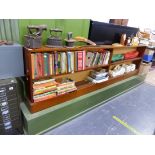 A LONG LOW MAHOGANY BOOK CASE.