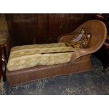 A BENTWOOD DAY BED WITH FEATHER SQUAB.