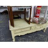 A PAINTED TWO DRAWER LOW COFFEE TABLE WITH CARVED DECORATION, TOGETHER WITH A RETRO NEST OF THREE