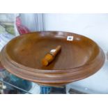 A LARGE WALNUT FRUIT BOWL,AND A TREEN NEEDLE CASE.
