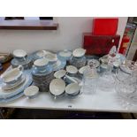 A ROYAL DOULTON REFLECTIONS PATTERN DINNER SERVICE, TWO CUT GLASS DECANTERS, A CUT GLASS ICE BUCKET,