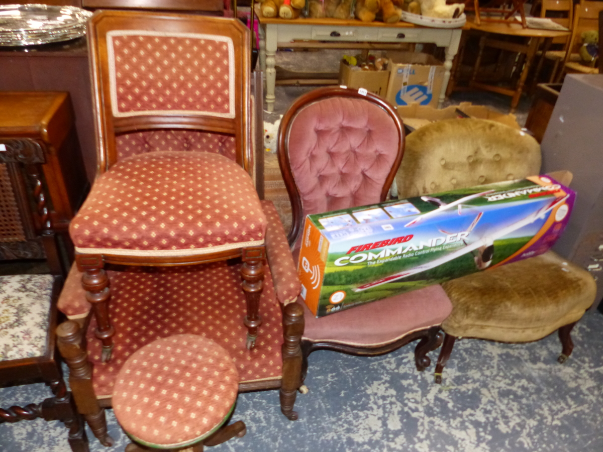 A VICTORIAN BUTTON BACK ARM CHAIR, SIMILAR SIDE CHAIR, A PIANO STOOL AND TWO NURSING CHAIRS.