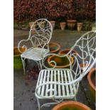 A PAIR OF PATIO CHAIRS