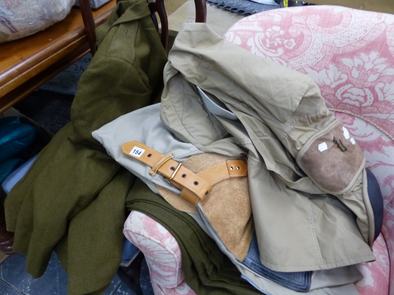 A MILITARY DRESS UNIFORM, AND TWO RIFLE SHOOTING JACKETS.