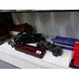 A MINICHAMPS SCALE MODEL BENTLEY, A KYOSHO FERRARI, A MODEL CANNON, DOORKNOBS, OTHER MODEL CARS ,