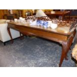A PAIR OF HARDWOOD AND BRASS INLAID LONG HALL TABLES ON CARVED CABRIOLE LEGS WITH PIERCED GALLERY