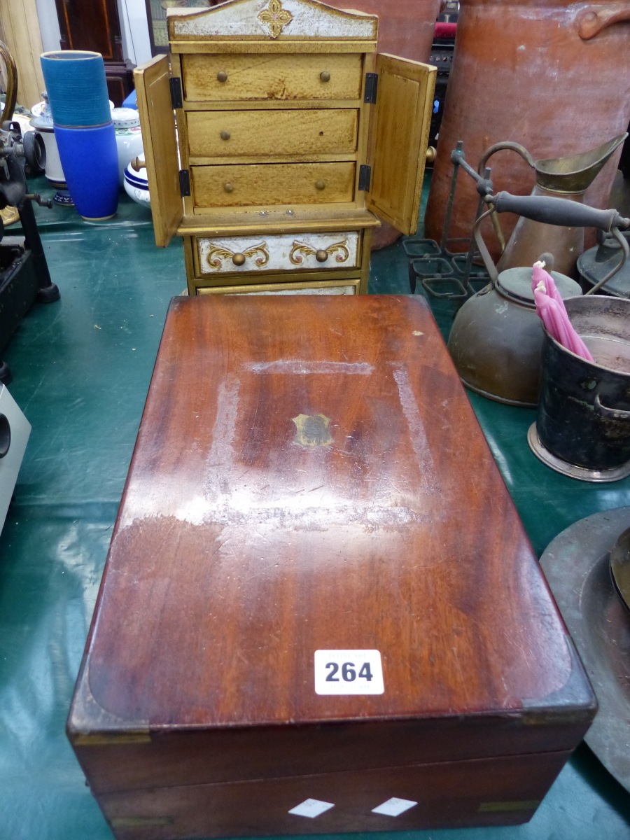 A VICTORIAN MAHOGANY WRITING BOX AND A DECORATIVE JEWELLERY CABINET WITH MUSICAL MOVEMENT.