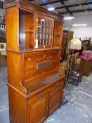 A LATE VICTORIAN CARVED WALNUT SECRETAIRE CABINET, FITTED INTERIOR WITH FALL FRONT ABOVE DRAWERS AND