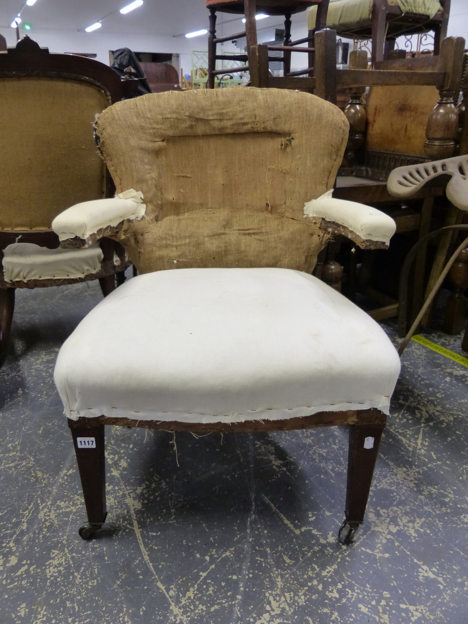 AN EDWARDIAN ARM CHAIR FOR RE UPHOLSTERY, ON SQUARE TAPER FOUR LEGS. SEAT HEIGHT 42cms. - Image 4 of 8
