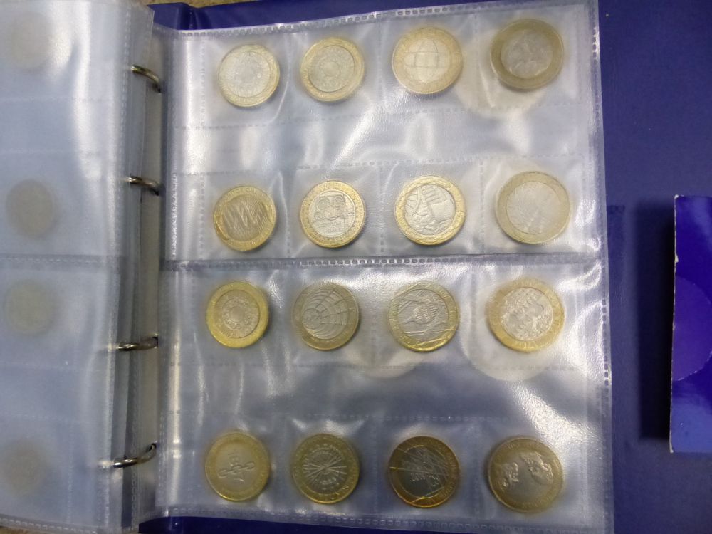 A QUANTITY OF VARIOUS COLLECTORS COIN INC. A LARGE NUMBER OF £1 AND £2 COINS, COLLECTORS CARDS TO - Image 24 of 32