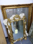 A CARVED GILT WOOD ROCOCO STYLE WALL MIRROR, A PAINTED FRAME MIRROR, AND A RECTANGLE GILT FRAME